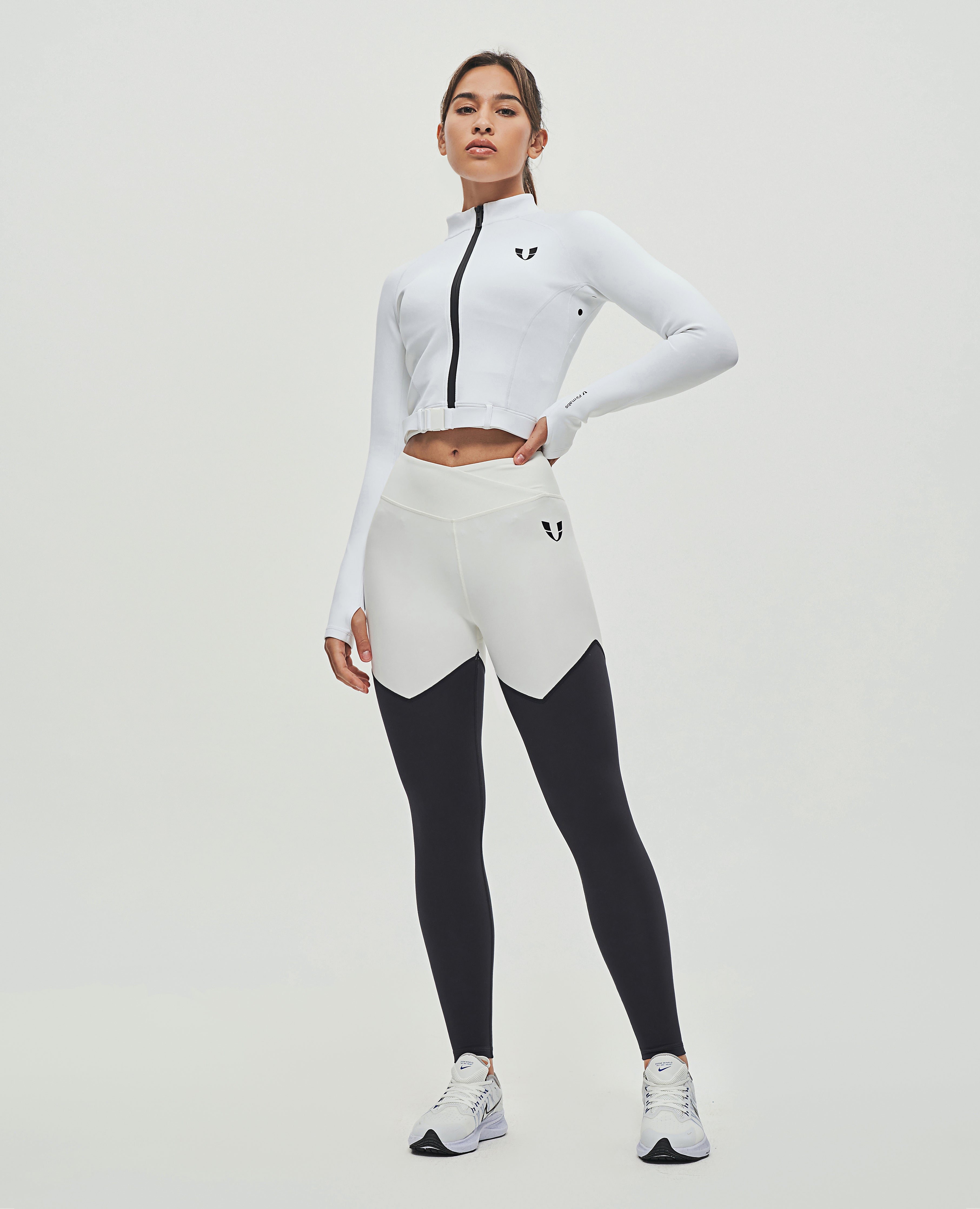 FIRM ABS white full-zip workout jacket for women with long sleeves and a fitted design